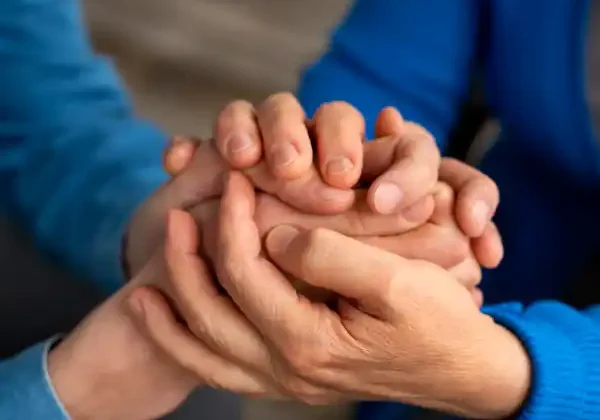 people-holding-hand-in-support York Funeral Services people-holding-hand-in-support